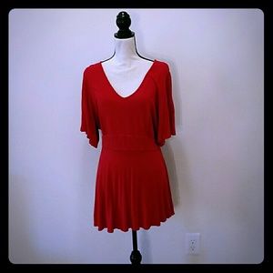 Red tunic top with sash.